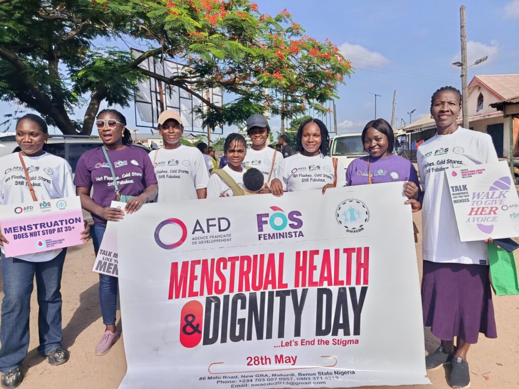 Banners proudly displaying FOS Feminista and AFD logos